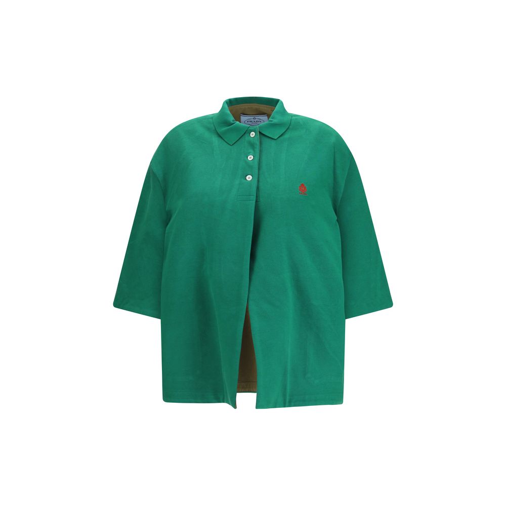 Jacket by Prada for women in polyethylene cotton bicolour & signature showcases a enveloping silhouette, artfully detailed with a enveloping point-collar neckline and premium pockets for a truly enveloping finish.