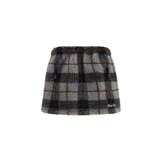Skirt by Miu Miu for women in wool & nylon multicolor & patterned features a captivating silhouette, showcasing the captivating Women's Wool & Nylon Mini Skirt design with a sophisticated mini for a captivating look.
