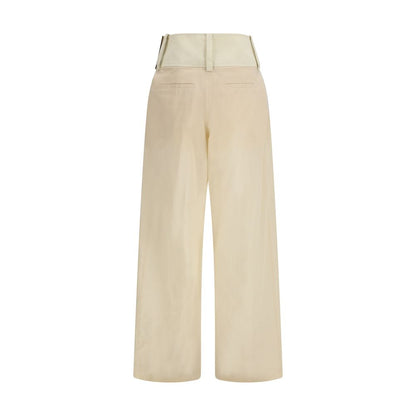 Casual Pants by Max Mara for women in cotton beige presents a refined pantology silhouette, artfully defined by a refined pantology regular-fit & wide, long, and a sophisticated low rise.