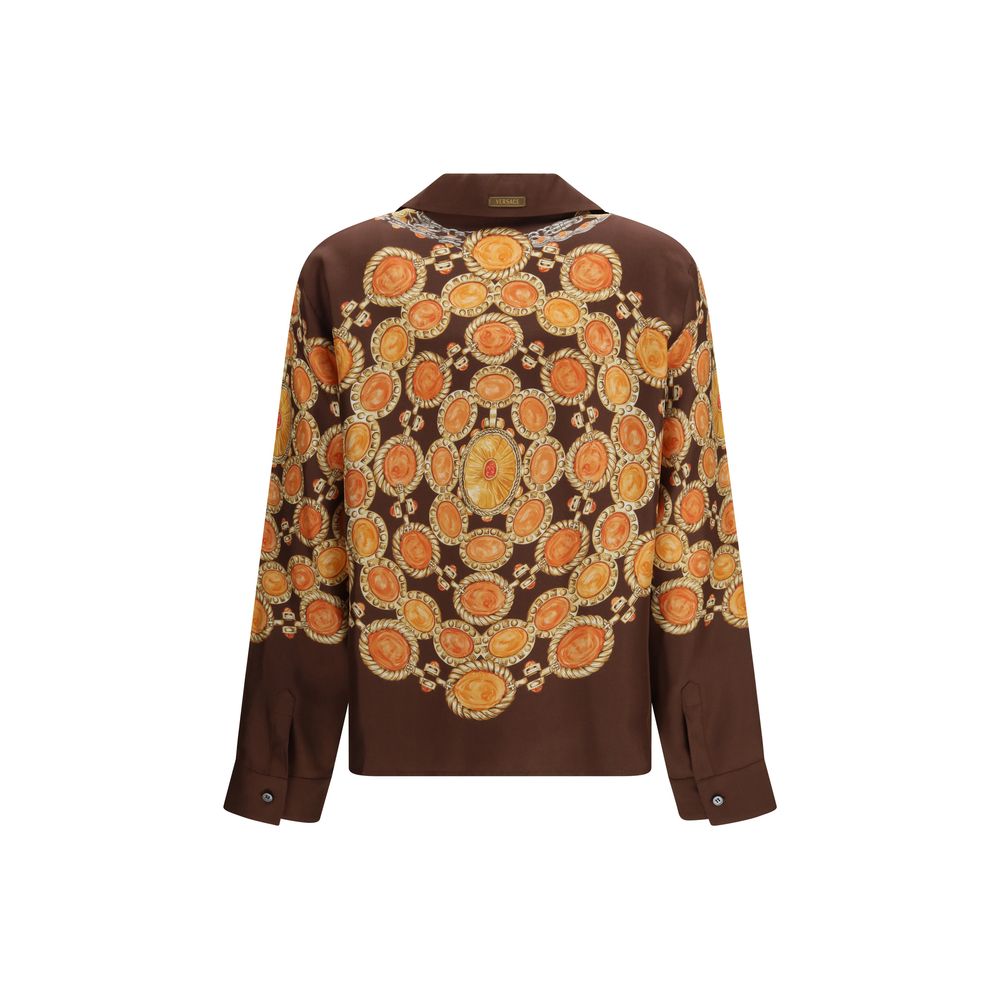 Shirt by Versace for women in fabric brown, patterned & print showcases a sublime silhouette, artfully detailed with a sublime and for a sophisticated, sublime finish.