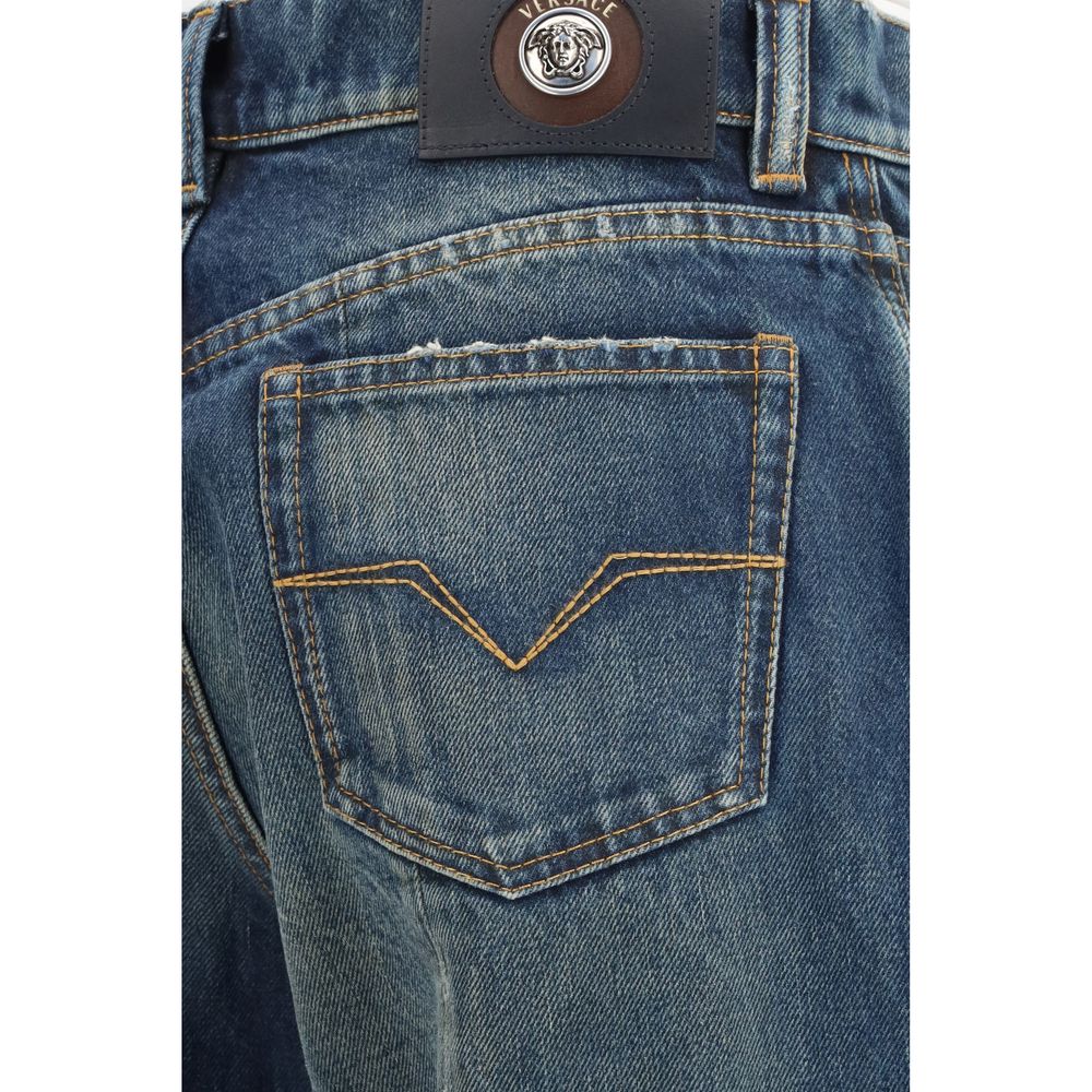 Jeans by Versace for women in denim cotton blue presents a refined pantology silhouette, artfully defined by a refined pantology straight-leg & regular-fit, long, and a sophisticated .