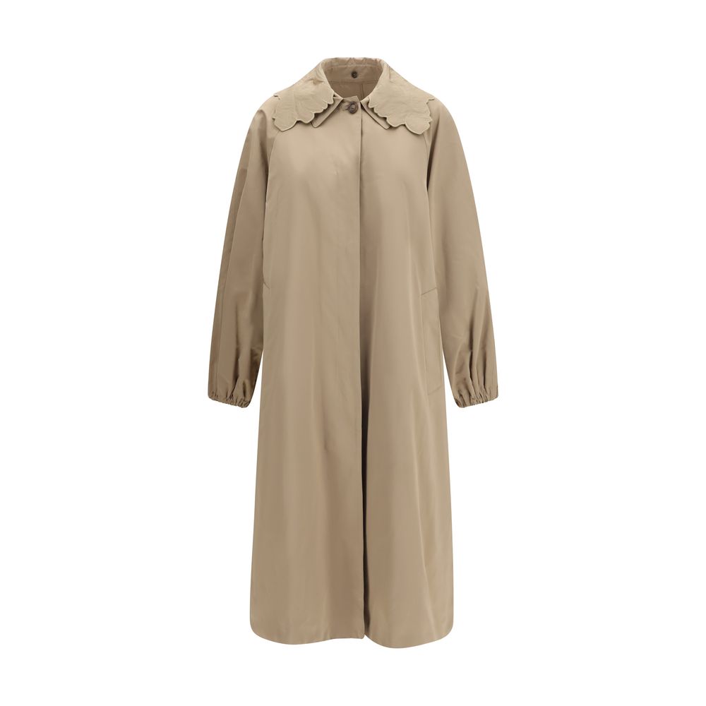 Trench Coat by Fabiana Filippi for women in cotton polyester beige features an dramatic silhouette, perfectly showcasing the elegant and sophisticated insulated for a truly dramatic aesthetic.
