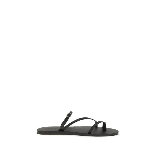 Flat Sandals by Manebi for women in bos taurus calf leather black & natural features an statuesque Women's Bos Taurus Calf Leather Flat Sandals silhouette with a refined flat and elegant .