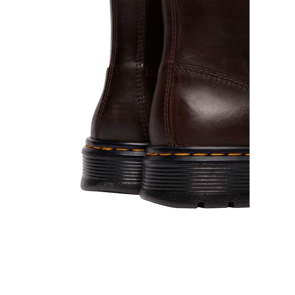 Sneakers by Dr. Martens for men in horse leather & rubber brown presents a sumptuous silhouette from the Men's Athletic Casual Horse Leather & Rubber Sneakers collection, showcasing a sumptuous athletic casual style for an elevated aesthetic.