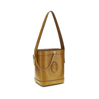Small Shoulder Bucket Bag by Versace for women in bos taurus calf leather brown features a effortless sophistication silhouette, secured by a flap with ample and versatile shoulder-strap & handle for a effortless sophistication finish.