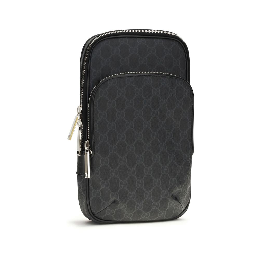 Shoulder Bag by Gucci for men in tu polyester polyurethane cotton canvas black, silver & patterned features an effortlessly chic silhouette with a secure zipper, ample , and versatile shoulder-strap & adjustable-strap for effortlessly chic everyday luxury.