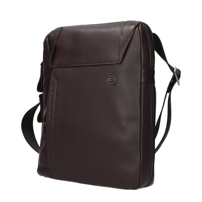 Crossbody Messenger Bag by Piquadro for men in leather brown features a statement-making Leather Crossbody Messenger Bag design with a secure , statement-making , and versatile crossbody-strap & adjustable-strap for a sophisticated look.