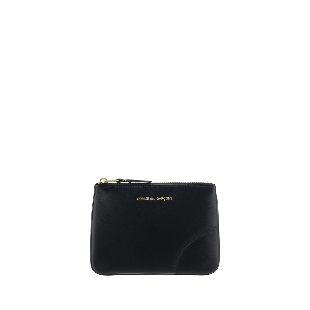 Wallet by Comme Des Garçons for men in bos taurus calf leather black & signature presents a streamlined silhouette, showcasing the sophisticated design of the Bos Taurus Calf Leather Wallet collection with functional compact-design coin-purse.
