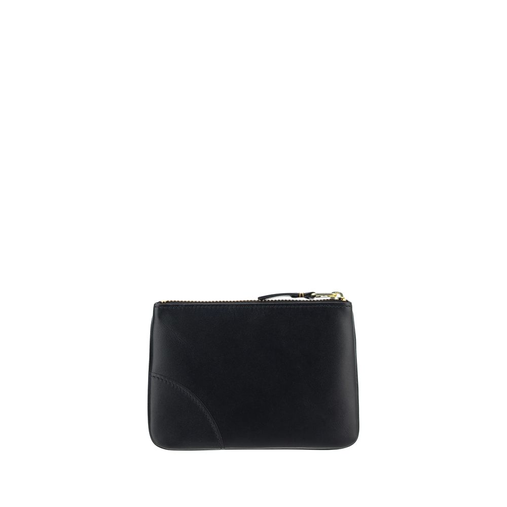 Wallet by Comme Des Garçons for men in bos taurus calf leather black & signature showcases a distinguished silhouette, artfully capturing the essence of the distinguished Bos Taurus Calf Leather Wallet design with functional compact-design coin-purse.