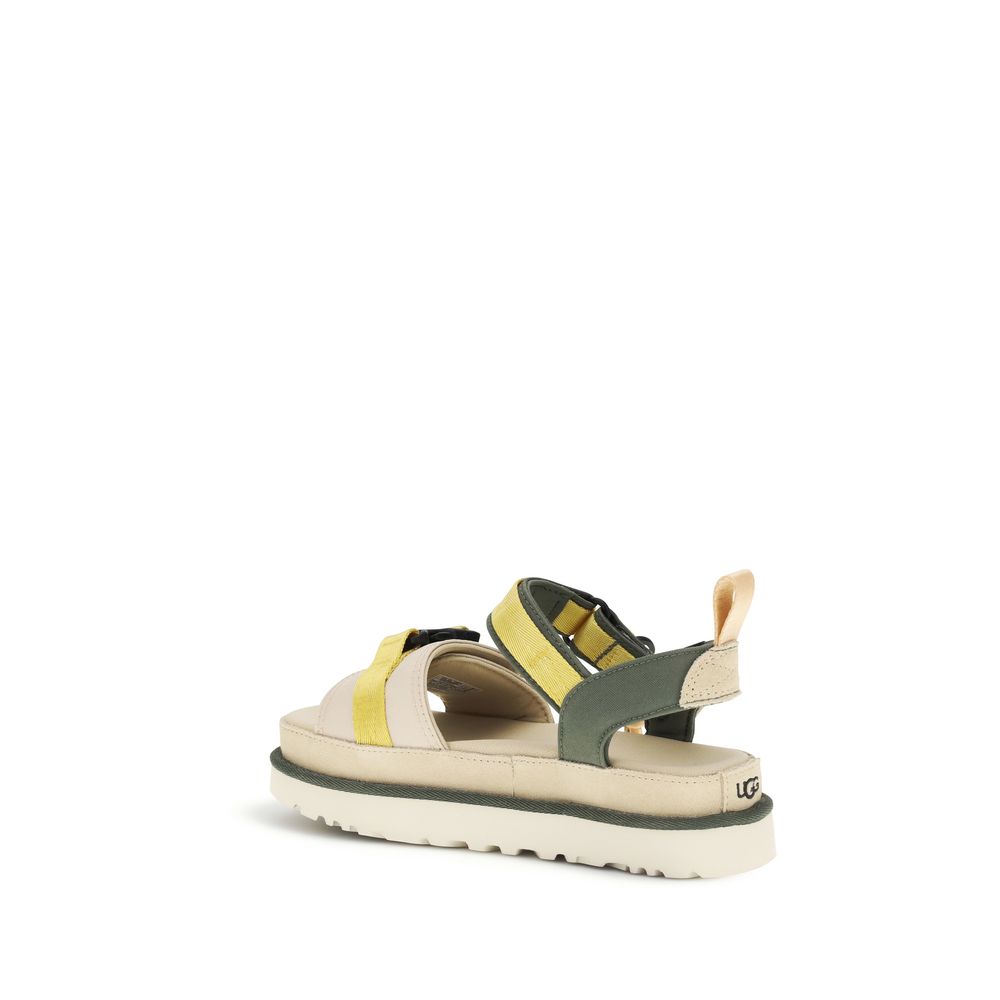 Flat Ankle Strap Sandals by UGG for women in cordura & polyester beige & natural features an architectural design from the Cordura Women's & Polyester Flat Ankle Strap Sandals collection, defined by a architectural flat and for a architectural finish.