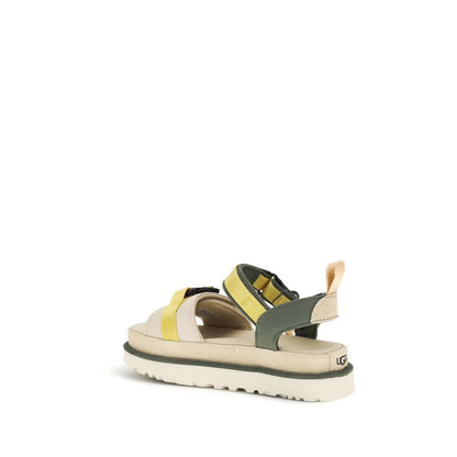 Flat Ankle Strap Sandals by UGG for women in cordura & polyester beige & natural features an architectural design from the Cordura Women's & Polyester Flat Ankle Strap Sandals collection, defined by a architectural flat and for a architectural finish.