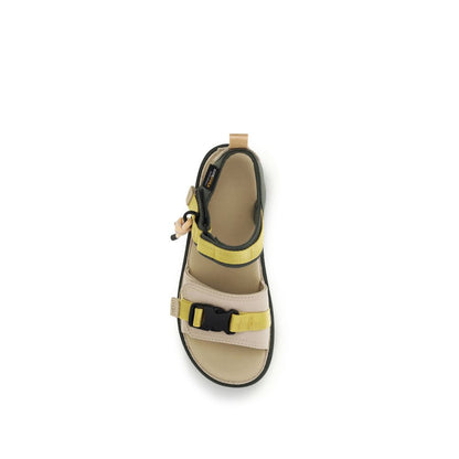Flat Ankle Strap Sandals by UGG for women in cordura & polyester beige & natural presents a sculptural silhouette, showcasing the Cordura Women's & Polyester Flat Ankle Strap Sandals design with a sculptural flat and for a premium look.