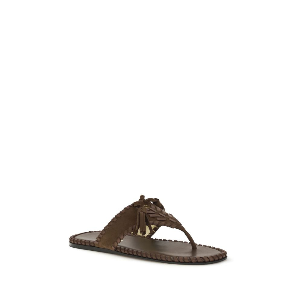 Flat Thong Sandals by Prada for women in bos taurus calf suede leather brown, gold & monogram features an effortlessly chic silhouette from the Women's Bos Taurus Calf Suede Leather Flat Thong Sandals collection, showcasing a effortlessly chic flat and elegant .