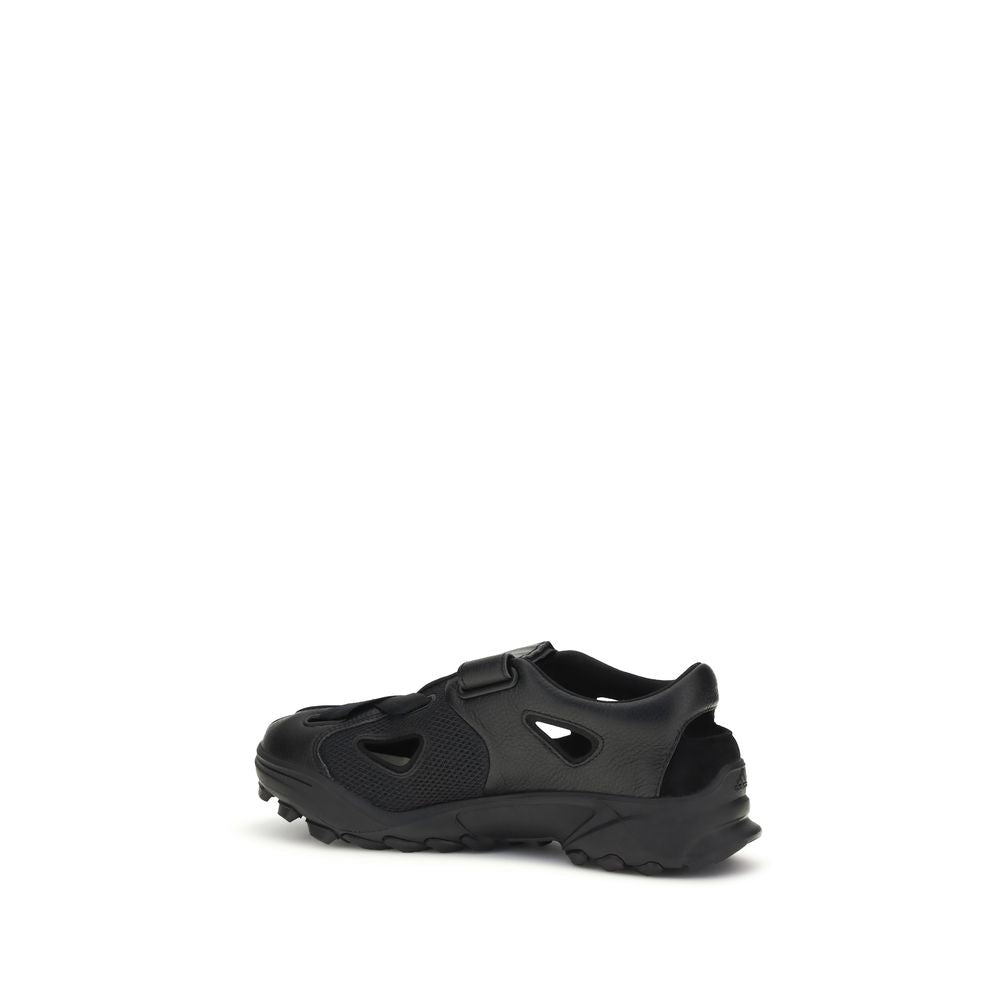 Flat Sandals by Y-3 for men in bos taurus suede calf leather and black presents a captivating silhouette, showcasing the signature style of the Men's Bos Taurus Suede Calf Leather Flat Sandals with a captivating flat and captivating .