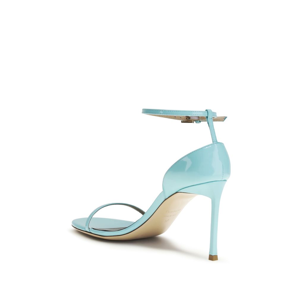 Stiletto Ankle Strap Sandals by Tom Ford for women in bos taurus calf patent leather and blue & nude presents a captivating silhouette, showcasing the signature style of the Women's Bos Taurus Calf Patent Leather Stiletto Ankle Strap Sandals with a captivating stiletto and captivating round toe style.