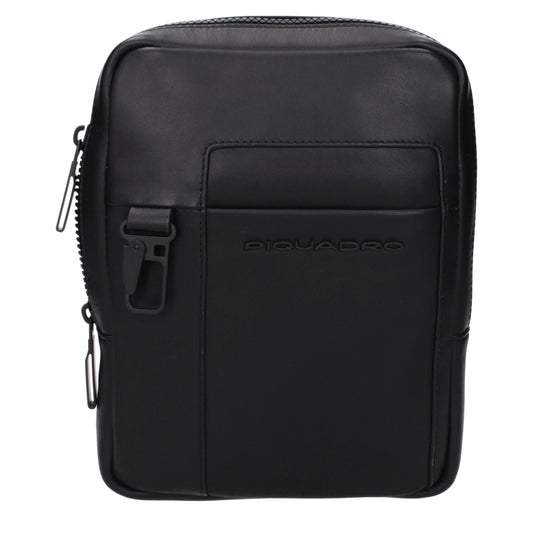 Crossbody Messenger Bag by Piquadro for men in leather black features a artisanal Leather Crossbody Messenger Bag design with a secure , ample , and versatile crossbody-strap & adjustable-strap for a artisanal look.