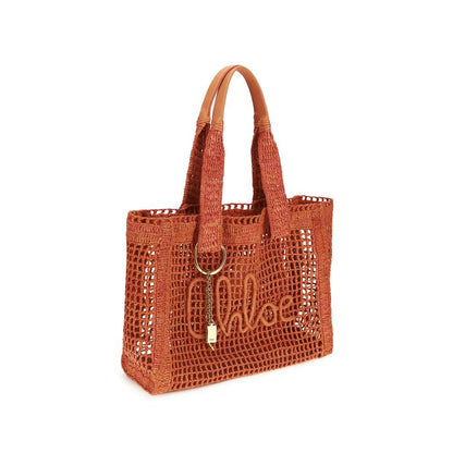 Small East West Shoulder Bag by Chloé for women in raffia polyester & buffalo leather multicolor & signature showcases a enviable silhouette, artfully detailed with a secure , organized , and versatile for a enviable look.