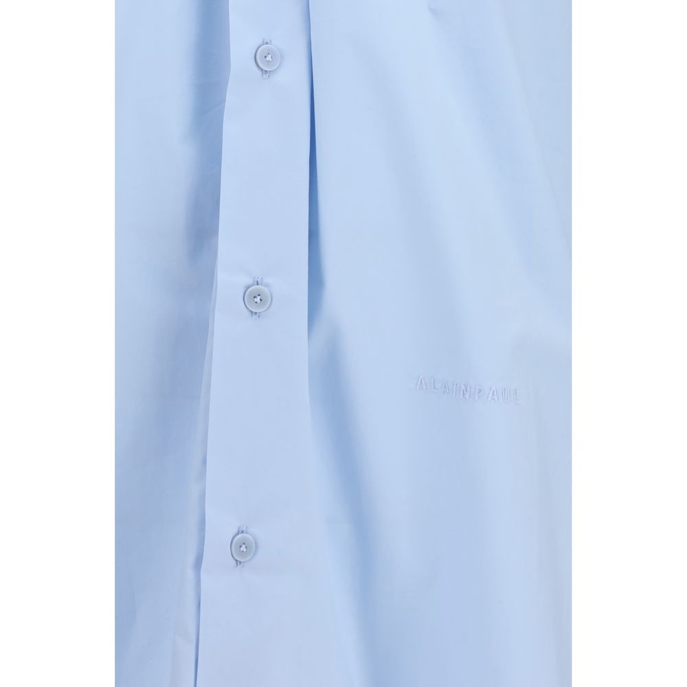 Dress Shirt by ALAINPAUL for women in cotton blue showcases a sleek silhouette, elegantly detailed with a sleek and for a sleek finish.