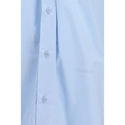 Dress Shirt by ALAINPAUL for women in cotton blue showcases a sleek silhouette, elegantly detailed with a sleek and for a sleek finish.