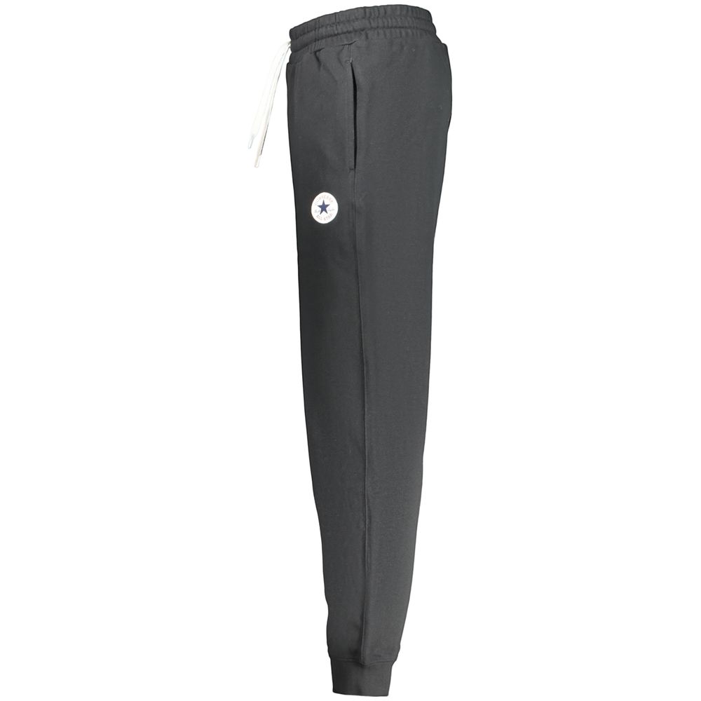 Joggers by Converse for men in cotton black features a polished silhouette with a polished regular-fit, reaching a polished long and finished with a polished .
