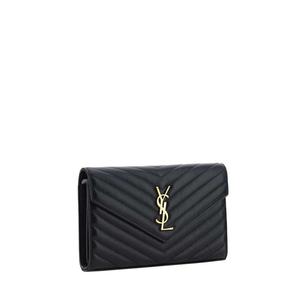 Quilted Shoulder Bag by Saint Laurent for women in lamb leather black, gold, monogram & print features a effortless chic silhouette with a secure snap & button, ample cardholder, and versatile shoulder-strap & handle for a effortless chic finish.