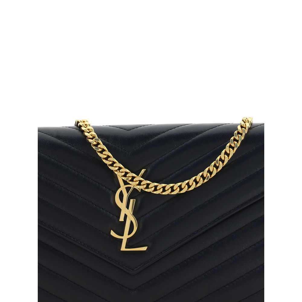 Quilted Shoulder Bag by Saint Laurent for women in lamb leather black, gold, monogram & print presents a versatile silhouette, showcasing a secure snap & button and versatile cardholder with versatile shoulder-strap & handle for a sophisticated look.