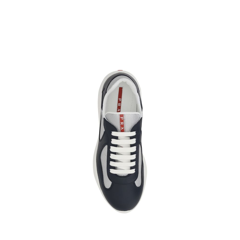 Athletic Sneakers by Prada for men in bos taurus calf leather & polyamide blue showcases an impeccable silhouette, defined by an impeccable athletic style design that perfectly captures the essence of the Men's Athletic Bos Taurus Calf Leather & Polyamide Sneakers.
