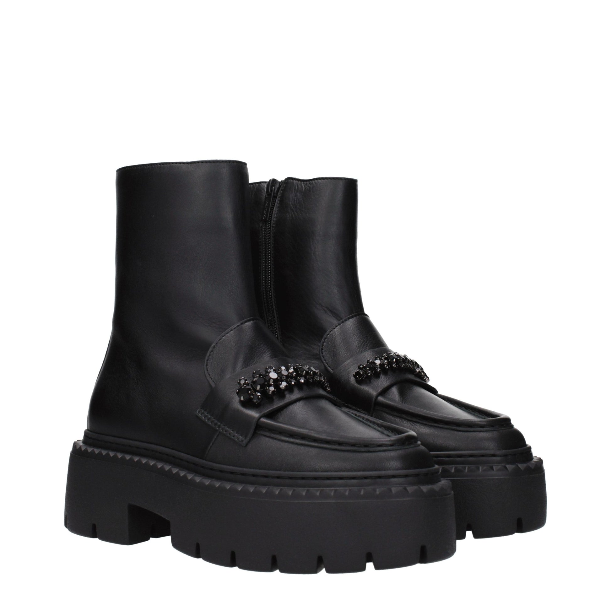Ankle Boots by Jimmy Choo for women in leather black features an avant-garde Women's Leather Ankle Boots silhouette, defined by a sophisticated and a avant-garde .