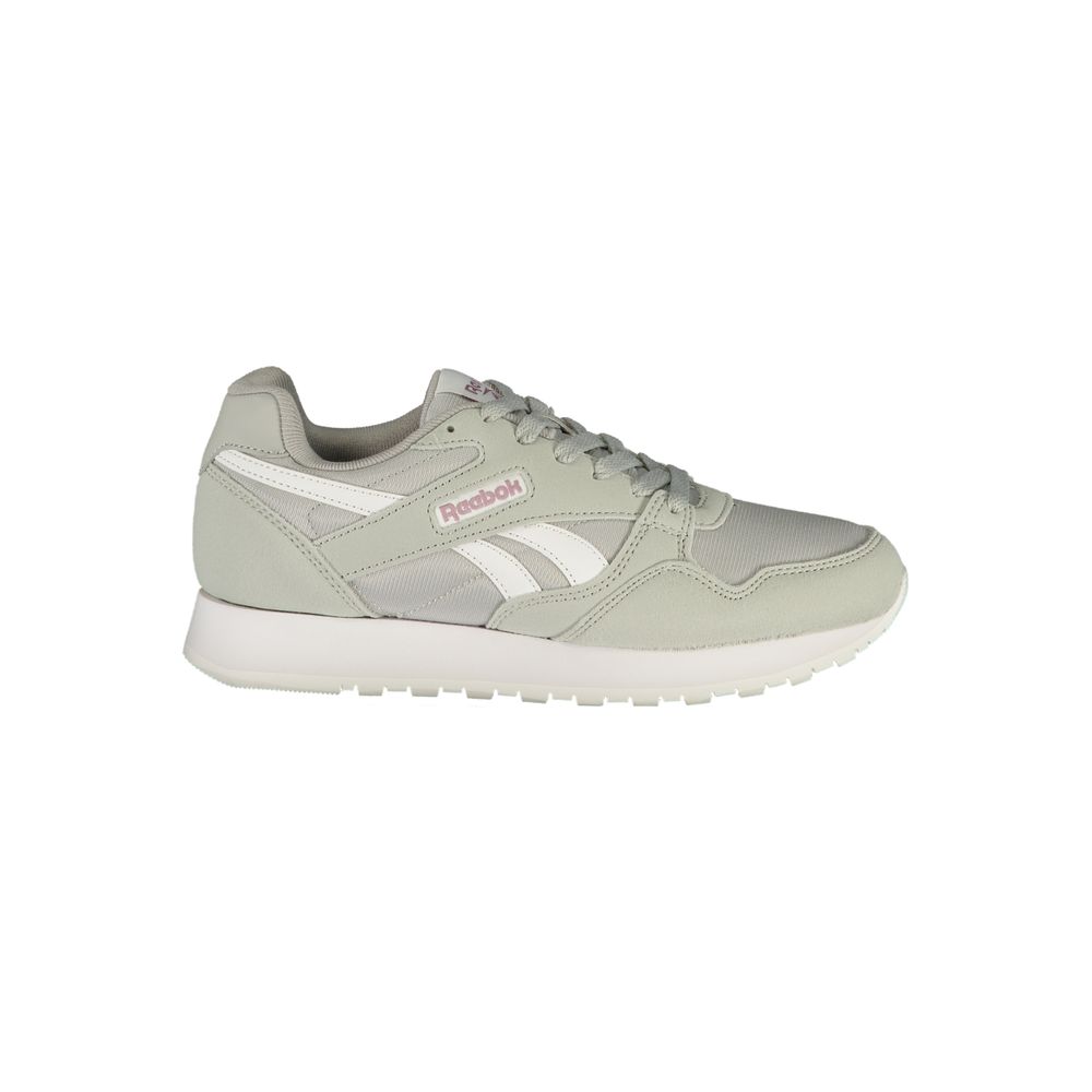 Athletic Sneakers by Reebok for women in polyester gray & print presents a sleek silhouette, perfectly capturing the athletic style essence of Women's Athletic Polyester Sneakers with its sleek design and premium finish.
