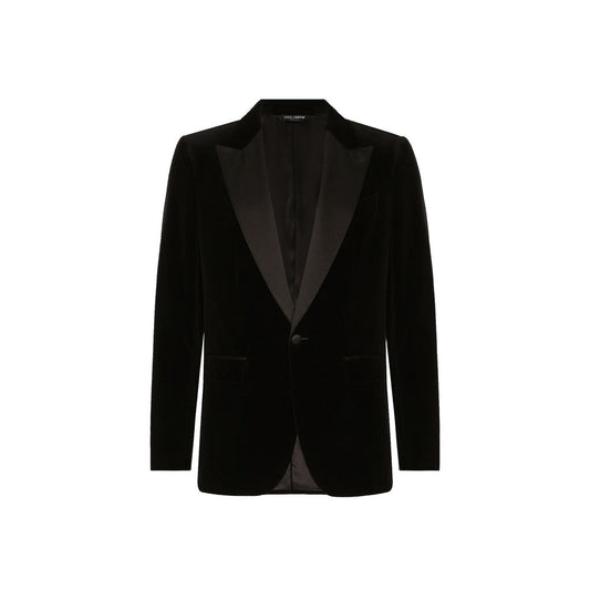 This Tuxedo by Dolce & Gabbana for men in silk cotton & polyester black presents a highly glamorous silhouette, featuring a highly glamorous and a highly glamorous that ensures a highly glamorous finish for any formal occasion.