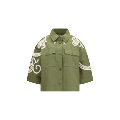 Overcoat by Max Mara for women in cotton canvas bicolour showcases a enveloping silhouette, detailed with distinctive pockets and a enveloping shirt-collar neckline.