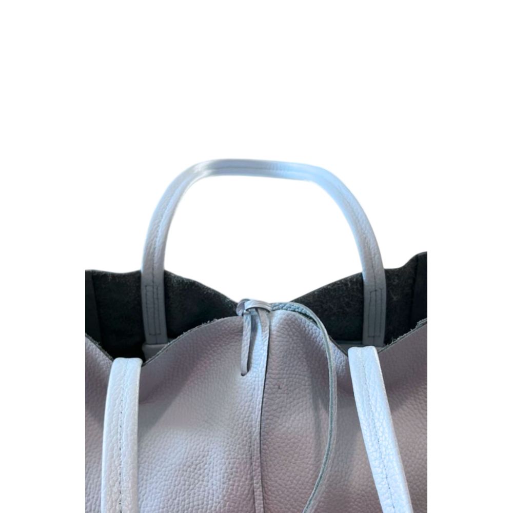 Shoulder Clutch Handbag by Baldinini Trend for women in cowhide blue & gold features a sculptural silhouette with a secure zipper, ample built-in-compartments, and versatile shoulder-strap for a sculptural finish.