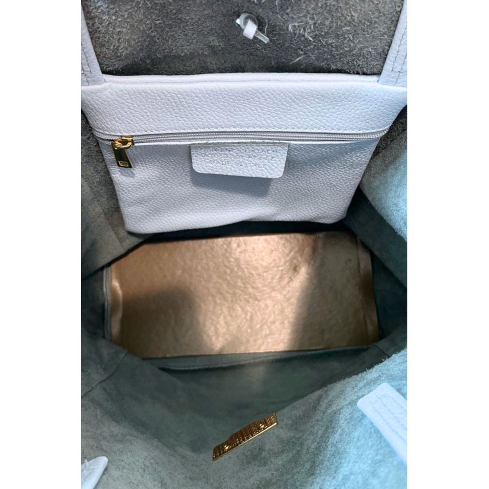 Shoulder Clutch Handbag by Baldinini Trend for women in cowhide blue & gold features a architectural silhouette, showcasing a secure zipper, ample built-in-compartments, and versatile shoulder-strap for a architectural finish.