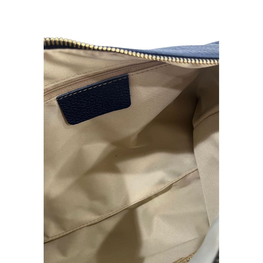 Shoulder Clutch Handbag by Baldinini Trend for women in cowhide blue & gold showcases a sculptural silhouette, featuring a secure zipper, ample built-in-compartments, and versatile shoulder-strap for a sculptural finish.