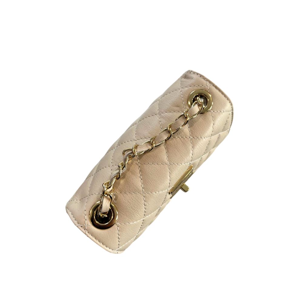 Mini 2-in-1 Shoulder & Crossbody Handbag by Baldinini Trend for women in cowhide beige & gold features a transformative elegance silhouette, showcasing a secure , organized , and versatile crossbody-strap & shoulder-strap for a transformative elegance look.