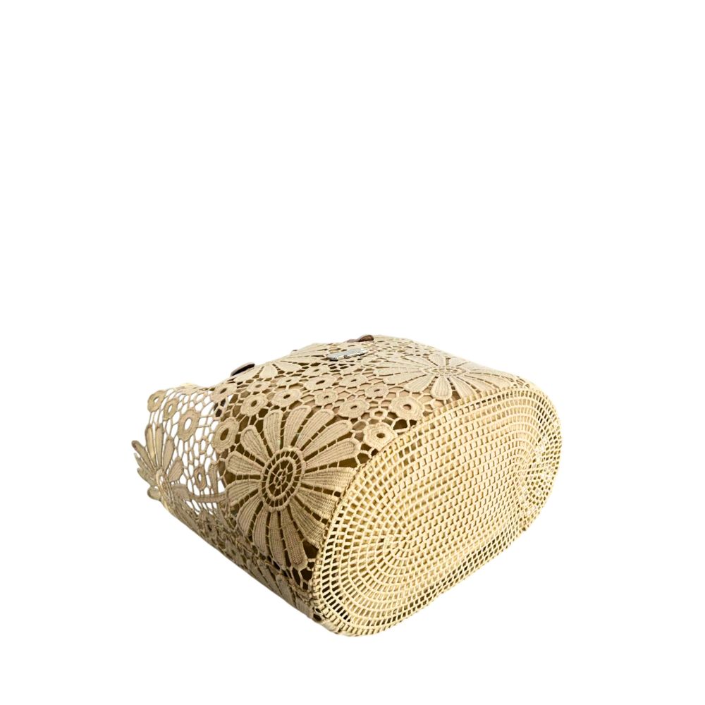 Drawstring Pouch Shoulder Bag by Baldinini Trend for women in polyurethane beige & floral features an effortlessly chic silhouette with a secure drawstring, ample , and versatile handle for effortlessly chic everyday luxury.