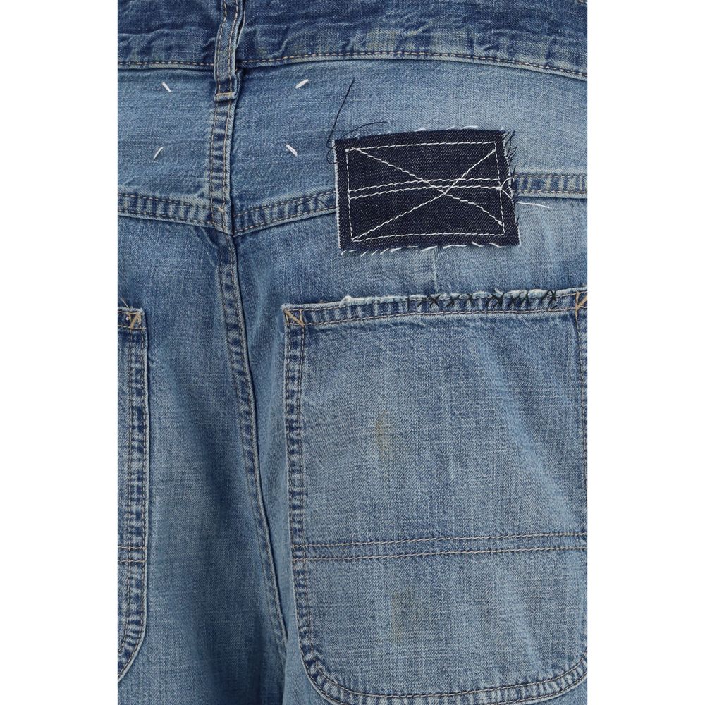 Jeans by Maison Margiela for women in denim cotton blue & patchwork features a polished silhouette with a polished relaxed-fit, wide & oversized, reaching a polished long and finished with a polished .