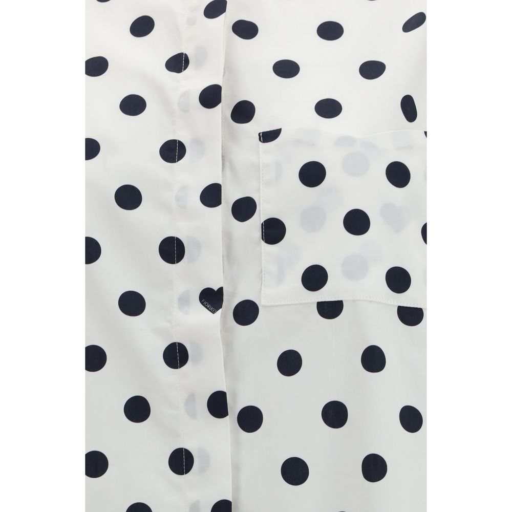 Dress by Fiorucci for women in cotton black, multicolor, white, patterned & print features a dramatic silhouette, showcasing an elegant and that flows into a dramatic midi.