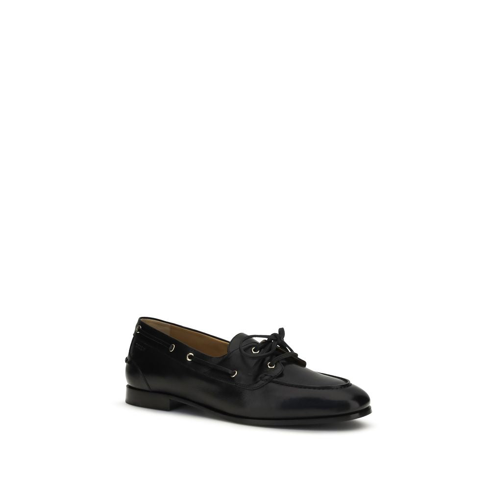 Boat Loafer Slip-On Shoes by Bally for men in buffalo leather black & gold showcases a impeccable silhouette as Men's Buffalo Leather Boat Loafer Slip-On Shoes, artfully designed with a impeccable and refined for a impeccable finish.