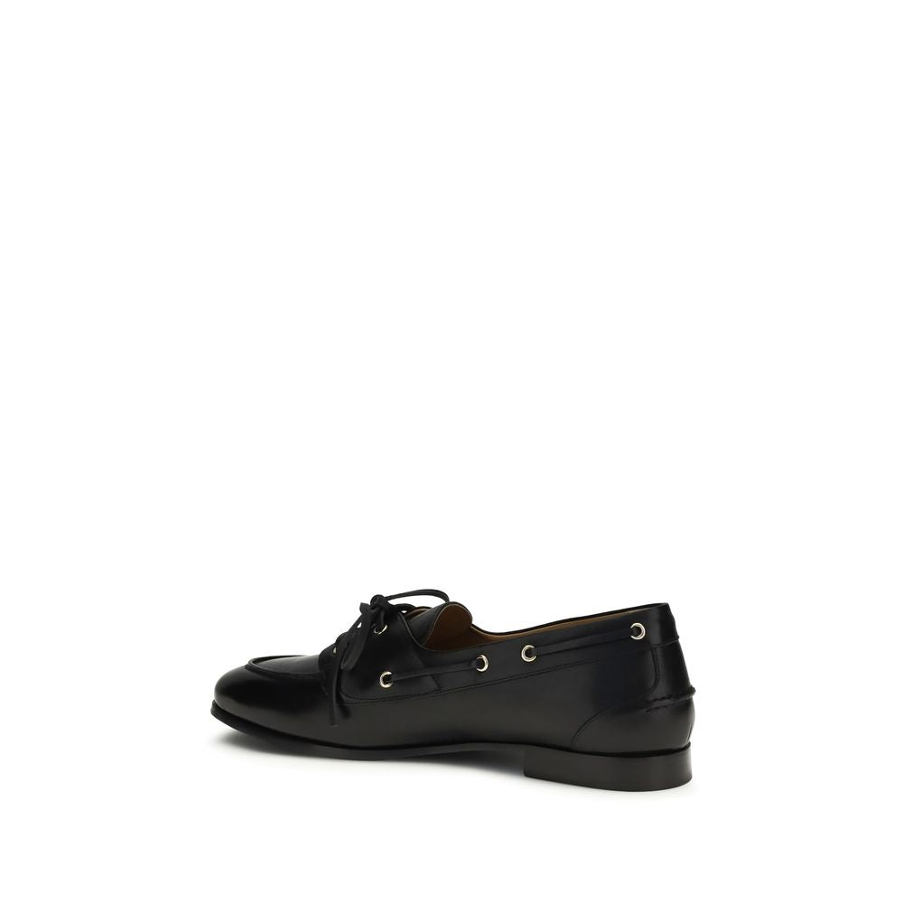 Boat Loafer Slip-On Shoes by Bally for men in buffalo leather black & gold features an dynamic silhouette from the Men's Buffalo Leather Boat Loafer Slip-On Shoes collection, defined by a dynamic and for a dynamic look.