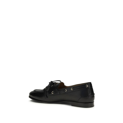 Boat Loafer Slip-On Shoes by Bally for men in buffalo leather black & gold features an dynamic silhouette from the Men's Buffalo Leather Boat Loafer Slip-On Shoes collection, defined by a dynamic and for a dynamic look.