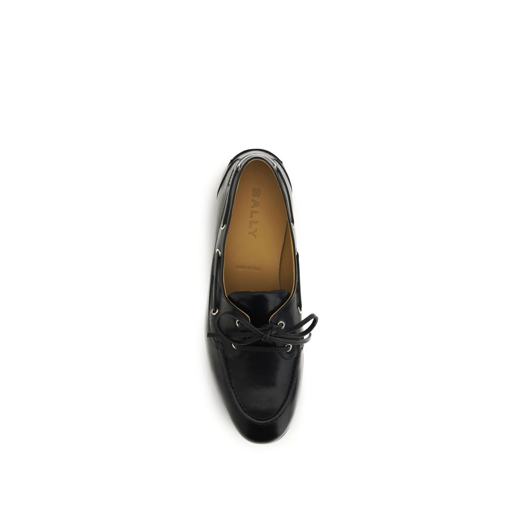 Boat Loafer Slip-On Shoes by Bally for men in buffalo leather black & gold showcases a timeless silhouette from the Men's Buffalo Leather Boat Loafer Slip-On Shoes collection, featuring a timeless and for a timeless finish.