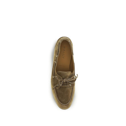 Boat Loafer Slip-On Shoes by Bally for men in suede buffalo leather beige & ebony showcases a timeless silhouette from the Men's Suede Buffalo Leather Boat Loafer Slip-On Shoes collection, featuring a timeless and for a timeless finish.