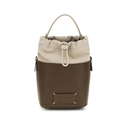 Bucket Handbag by Maison Margiela for women in bos taurus calf leather brown & signature features a effortlessly chic silhouette, showcasing a secure , ample , and versatile for a effortlessly chic look.