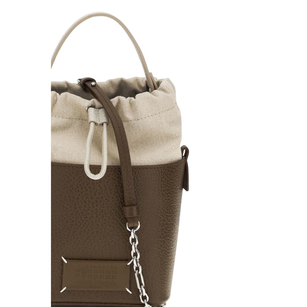 Bucket Handbag by Maison Margiela for women in bos taurus calf leather brown & signature features a resort-ready silhouette with a secure , ample , and versatile for a resort-ready finish.