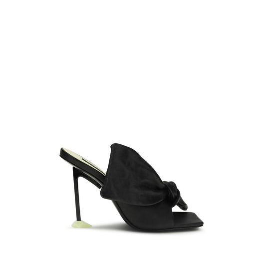 Mules Flat Shoes by Givenchy for women in nappa leather black presents a effortless chic silhouette, showcasing the Women's Nappa Leather Mules Flat Shoes design with a effortless chic and for a sophisticated look.