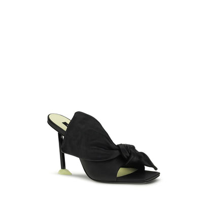 Mules Flat Shoes by Givenchy for women in nappa leather black showcases a enchanting silhouette as part of the Women's Nappa Leather Mules Flat Shoes collection, defined by a enchanting and for a enchanting look.