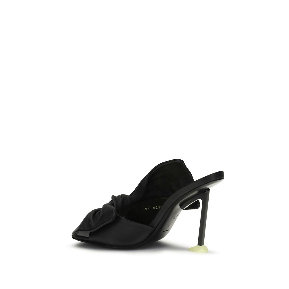 Mules Flat Shoes by Givenchy for women in nappa leather black features an captivating silhouette, showcasing the captivating style of the Women's Nappa Leather Mules Flat Shoes with its distinct and refined .