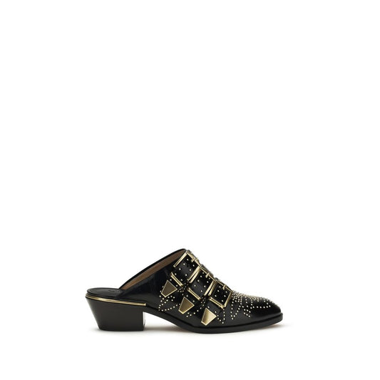Mules Flat Shoes by Chloé for women in bos taurus calf leather black features an captivating silhouette, showcasing the captivating style of the Icon Women's Bos Taurus Calf Leather Mules Flat Shoes with its distinct and refined .