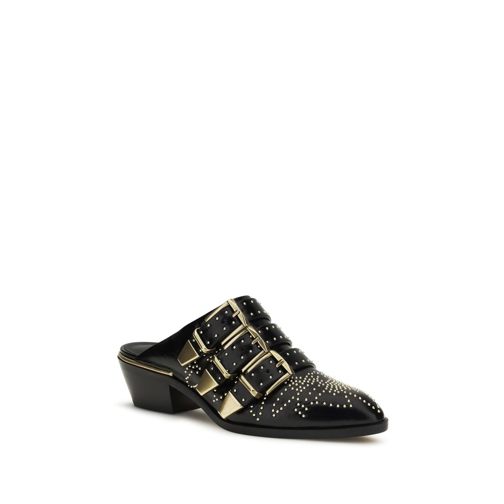 Mules Flat Shoes by Chloé for women in bos taurus calf leather black showcases a enchanting silhouette as part of the Icon Women's Bos Taurus Calf Leather Mules Flat Shoes collection, defined by a enchanting and for a enchanting look.